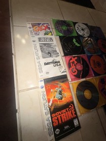 sega saturn game lot With Manuals. Not Tested But No Visible Damage To Discs