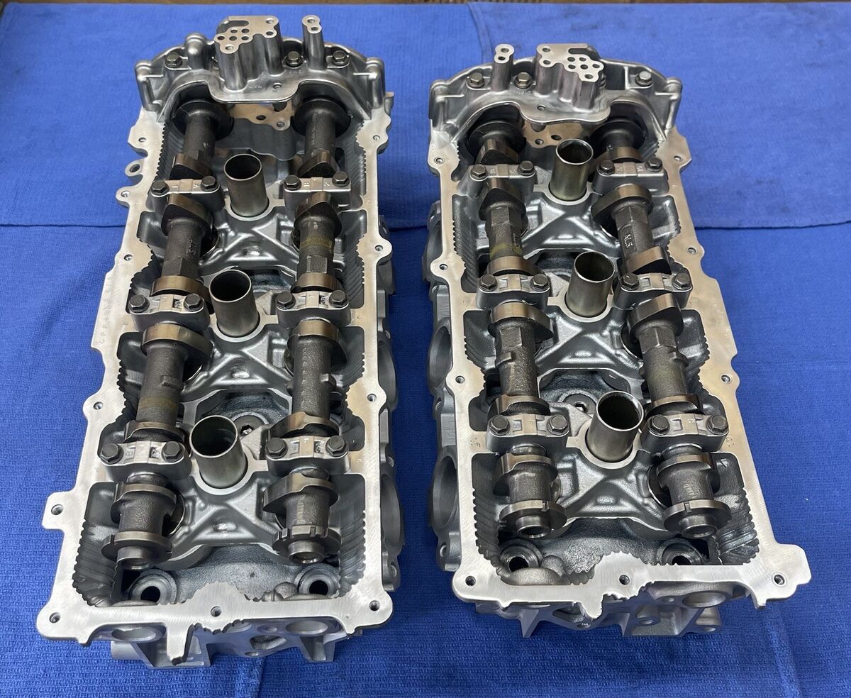 2 NISSAN Infiniti 3.5 V6 CYLINDER HEADS CASTING REA / LEA