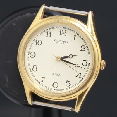 QZ Seiko Alba SUCCESS V701-6E20 elfenbeinfarbenes Zifferblatt Damenuhr...