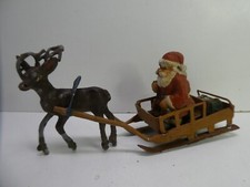 VINTAGE CAST METAL TOY MODEL SANTA REINDEER AND SLEIGH