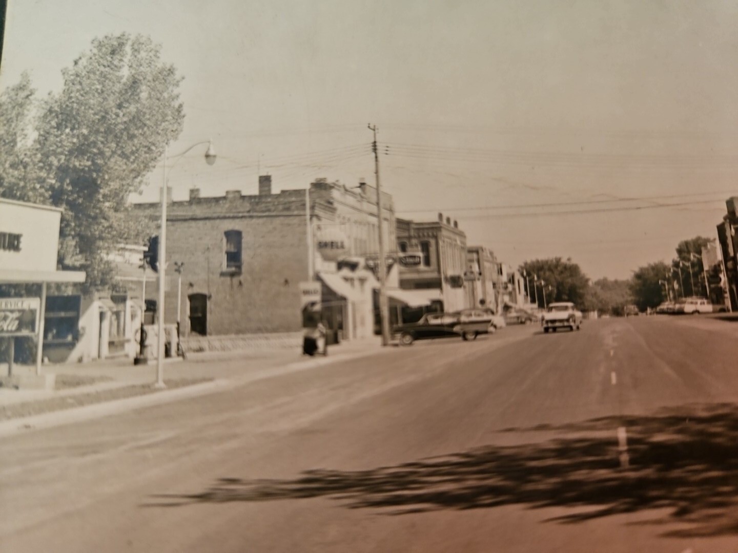 1950's Belle Plaine MN. RPPC Street Scene Ford Dealership John Deere