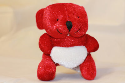 RED PLUSH LITTLE TEDDY BEAR HOLDING A WHITE HEART THREE INCH HIGH