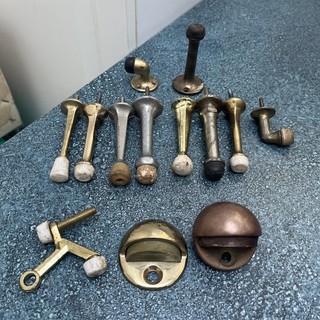 LOT OF 13 VINTAGE DOOR STOPS