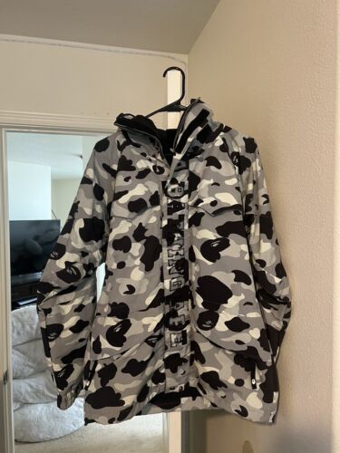 Buy Aape By A Bathing Ape men camouflage long sleeve hooded jacket  windbreaker jacket black and dark grey combo Online