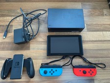 Nintendo Switch Console 32GB with Neon Blue/Neon Red controllers. 