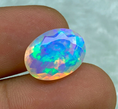 5ct Faceted Ethiopian Opal, Welo Opal Oval Cut, MultiFire 5/5 Opal, Faceted Opal - Picture 1 of 5