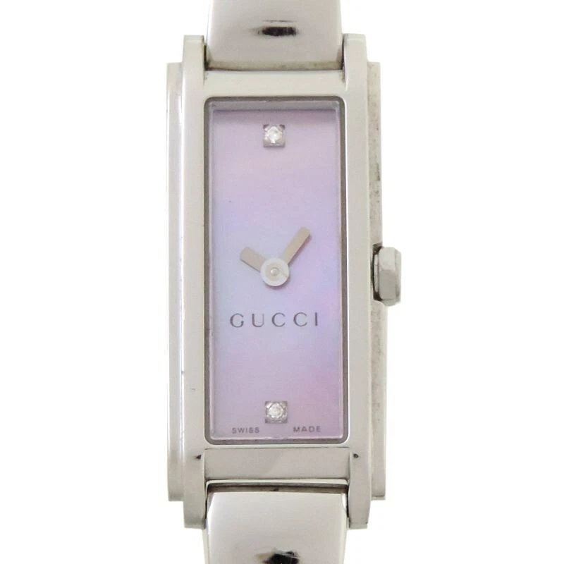 Montre Gucci 109 quartz 13 mm femme cadran rose fabrication suisse rectangle vintage Japon