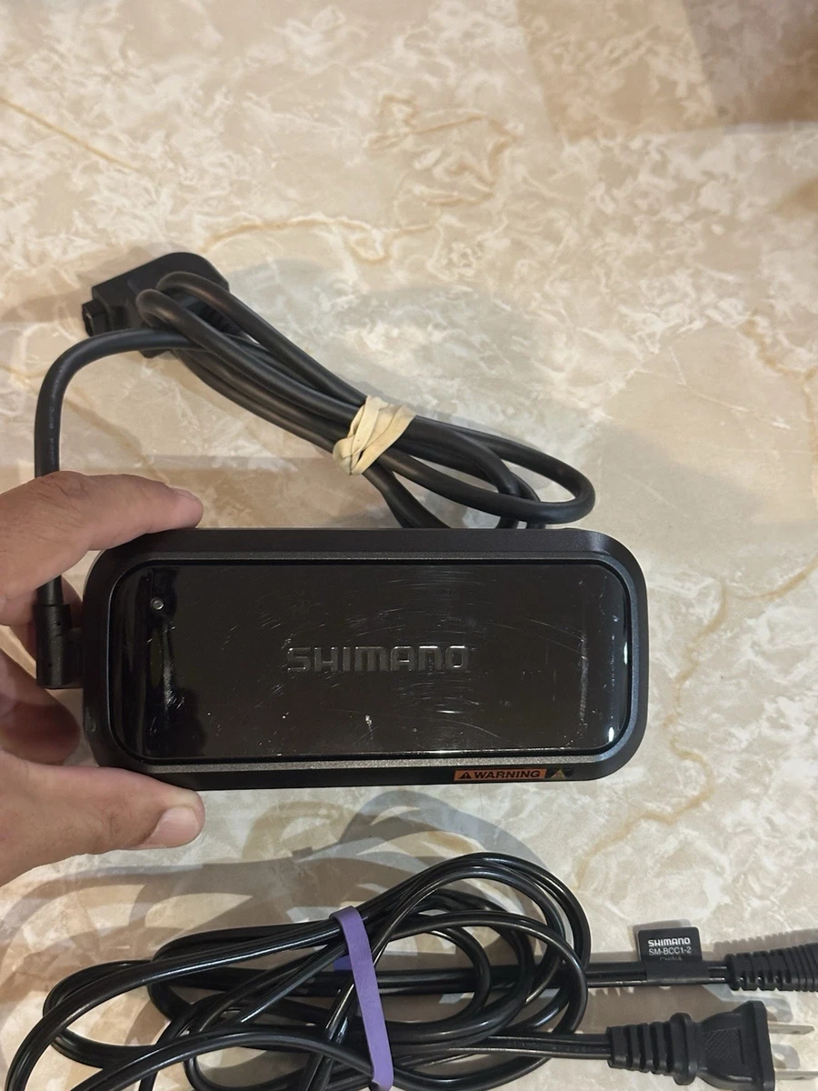 Cargador Negro SHIMANO - Accesorio Para Componentes De Bicicleta, Compatible Con Varios Sistemas