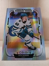 2025-26 O-Pee-Chee Hockey Luca Cagnoni # 556 MARQUEE ROOKIE RAINBOW FOIL 329/350