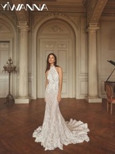 2026 Opulent Beaded Wedding Dress Halter Backless Bridal Gown Mermaid Long Dress