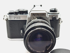 Clean - Nikon FE2 Film Camera with 35-70 100-50 lenses mm zooms Tested