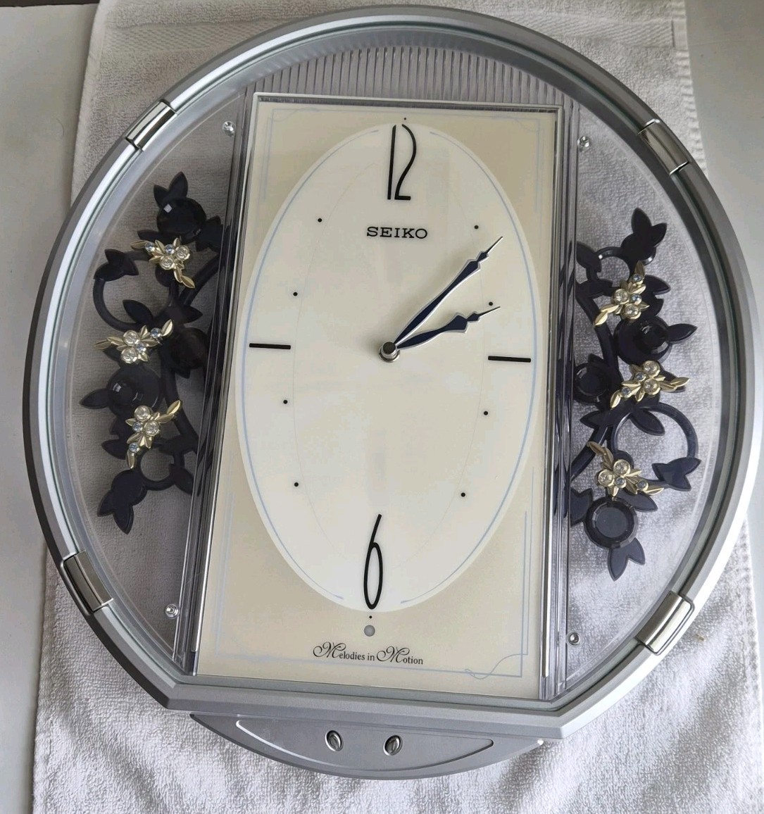 Seiko Melodies in Motion Musical Wall Clock Seiko Melodies in Motion Musical Wall Clock Swarovski Crystals QXM 554 BRH 12 Tune image
