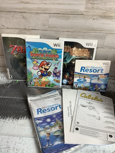 Nintendo Wii mit 4 Spielen, 2 Controllern, Nunchucks, Top Shot Elite. - Bild 6 von 11