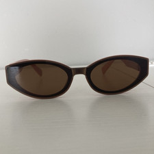 MIU MIU Women s Oval Sunglasses Pink Plastic Frame Brown Tinted Lenses
