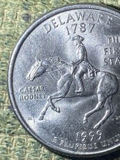 1999 P Delaware Quarter Spitting Horse Coin