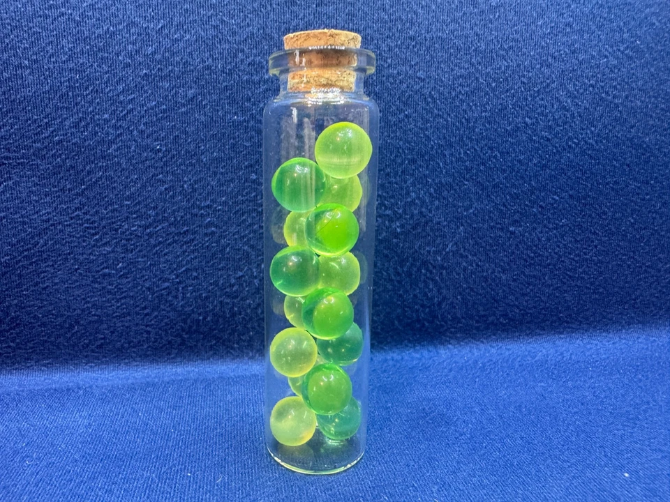 Uranium Glass Large Vile Of 15 Marbles 1cm Each, 8cm Tall Vile Green & Vaseline - image 3 of 4
