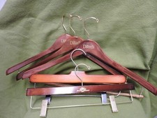 3 Dillards Wooden Coat Hangers and 2 Woode Pants Hangers