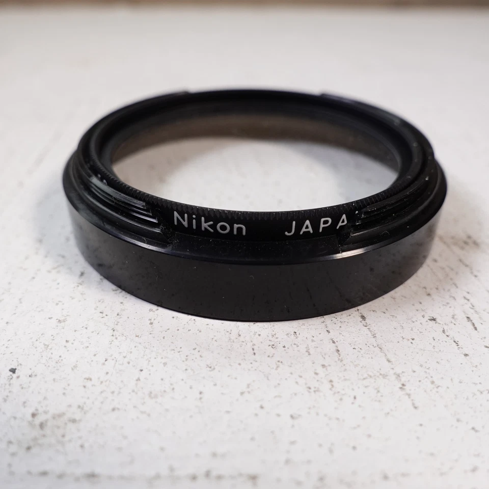 Vintage Nikon 58mm UV filter with hood - Image 2 of 3