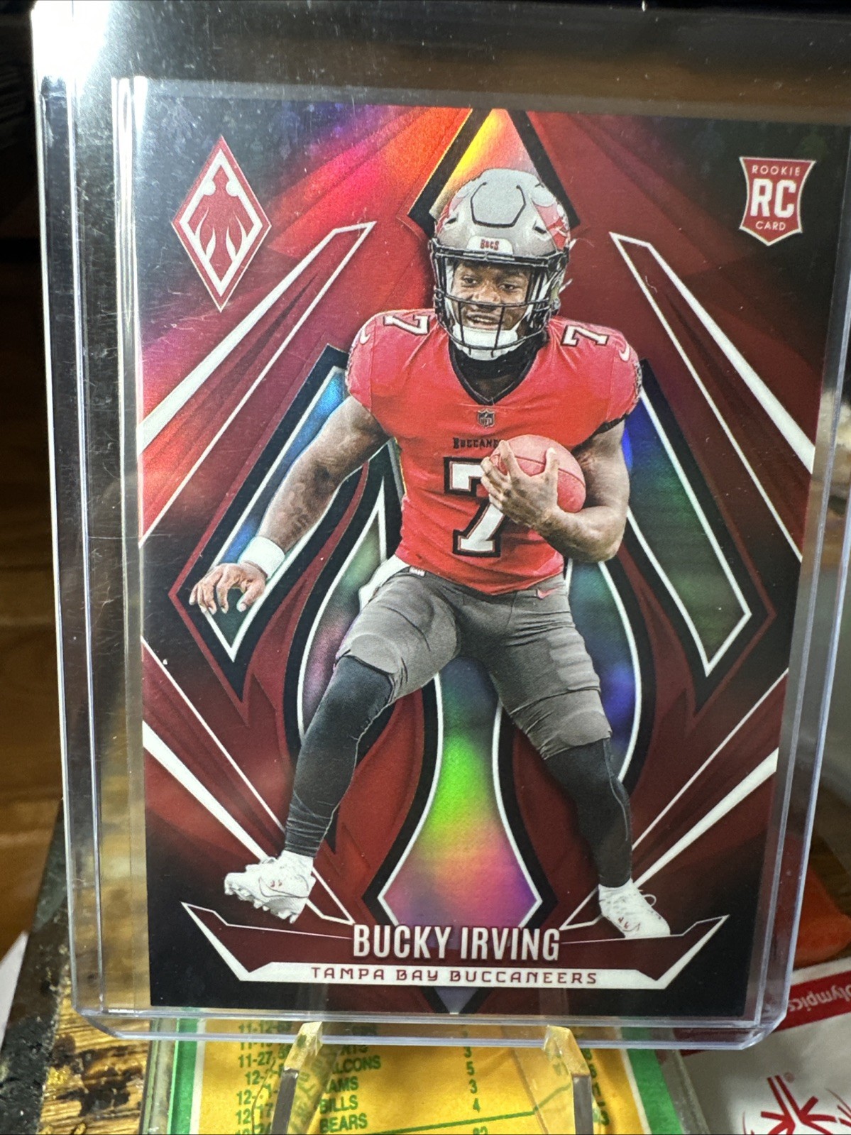 2024 Panini Phoenix - Rookies Bucky Irving #166 Red /99 (RC)