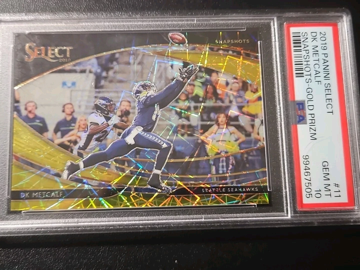 DK Metcalf Panini Select Snapshots #11 Gold Prizm
