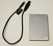 Seagate Backup Plus Portable Drive 1.5TB SRD00F1 Works Great, low Mileage.