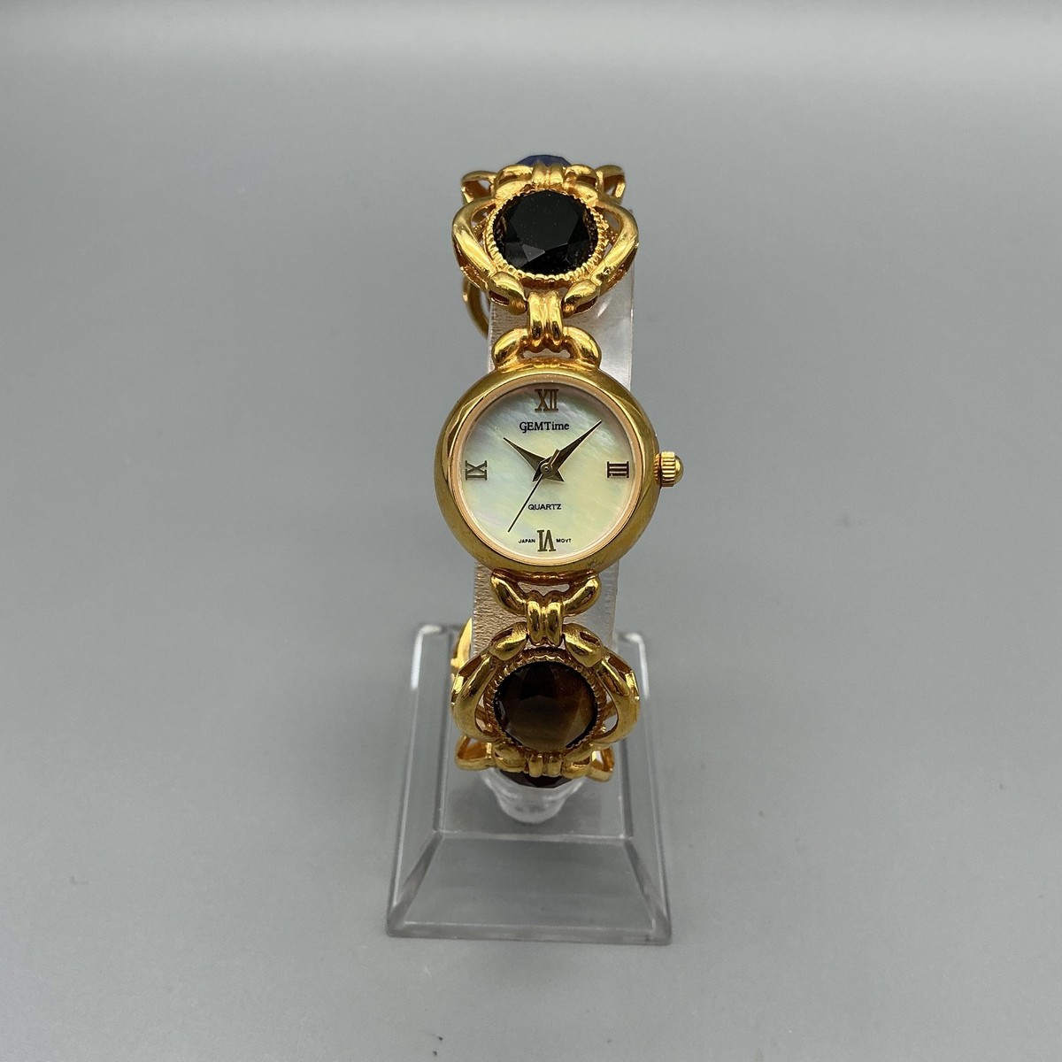 GEMTime Womens Watch 19mm MOP Gold Tone Multicolor Stone New  display picture 1