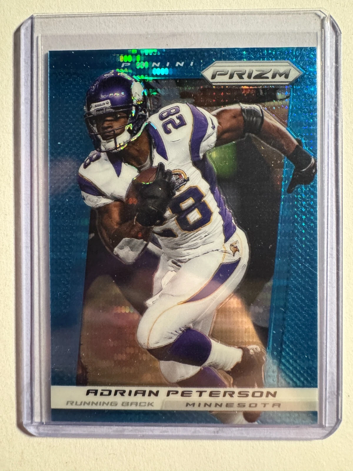 K258,612 - 2013 Panini Prizm Prizms Blue Pulsar #124 Adrian Peterson