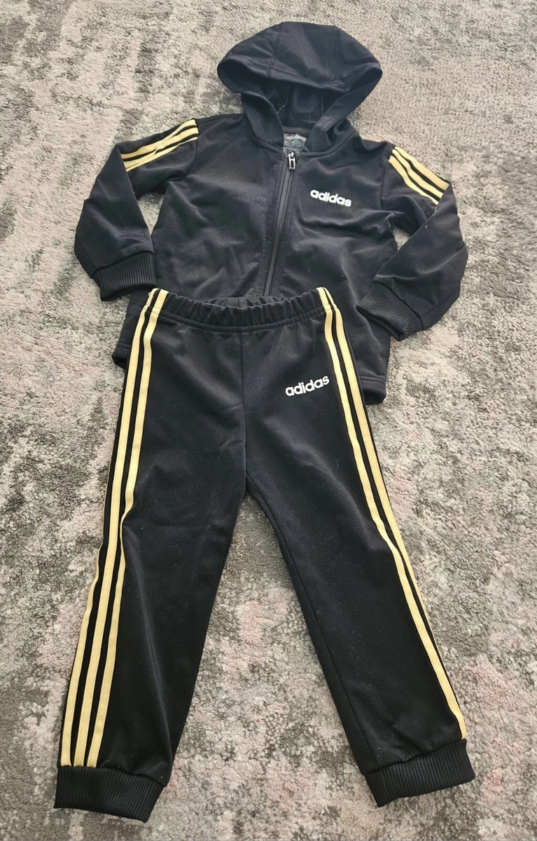 Black and clearance gold adidas tracksuit