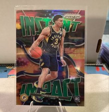 2021-22 Panini Prizm - Instant Impact Chris Duarte #17 Green Prizm (RC)