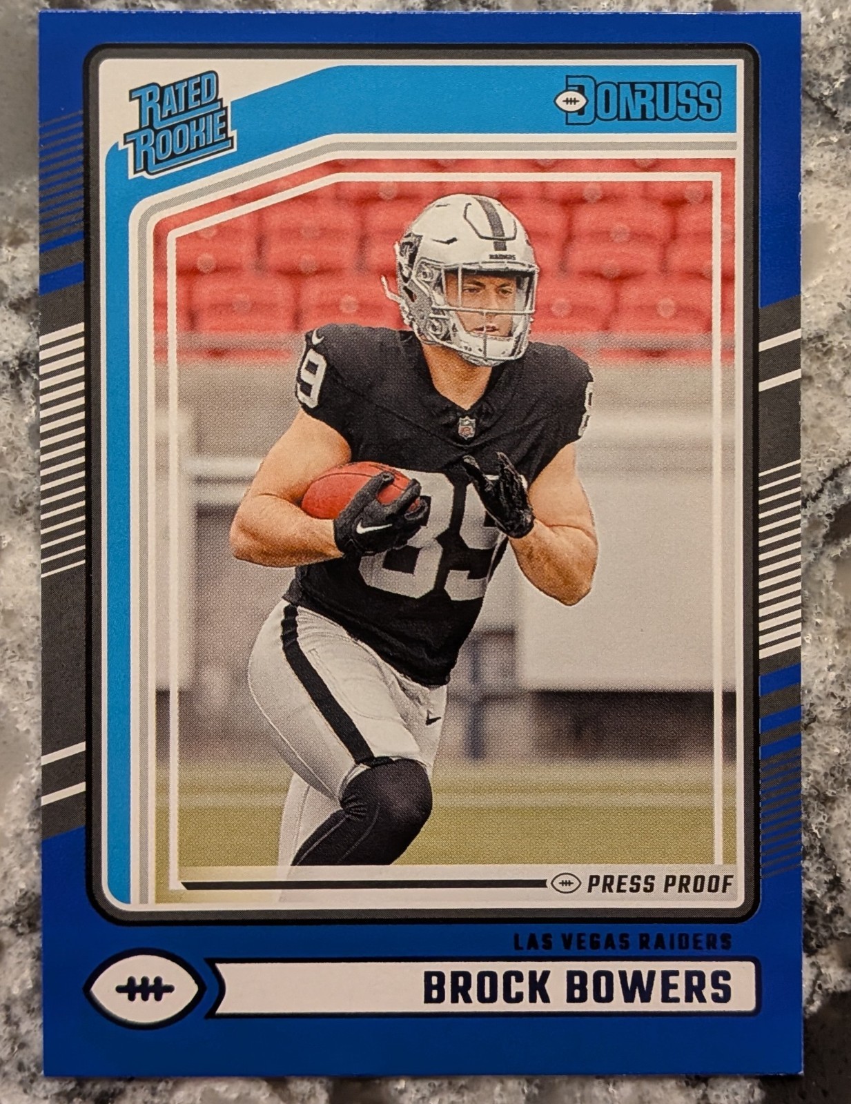 2024 Panini Donruss - Rated Rookie Brock Bowers #394 Blue Press Proof (RC)