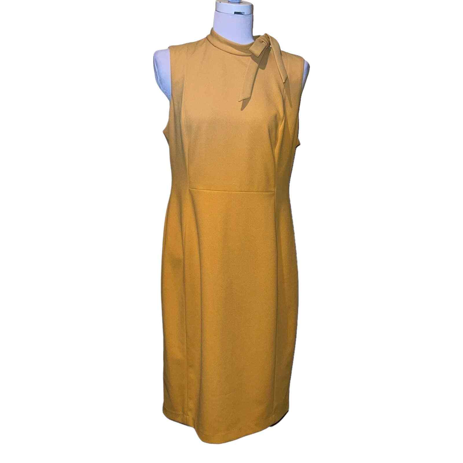 Descubrir 32+ imagen calvin klein mustard dress Thptnganamst.edu.vn