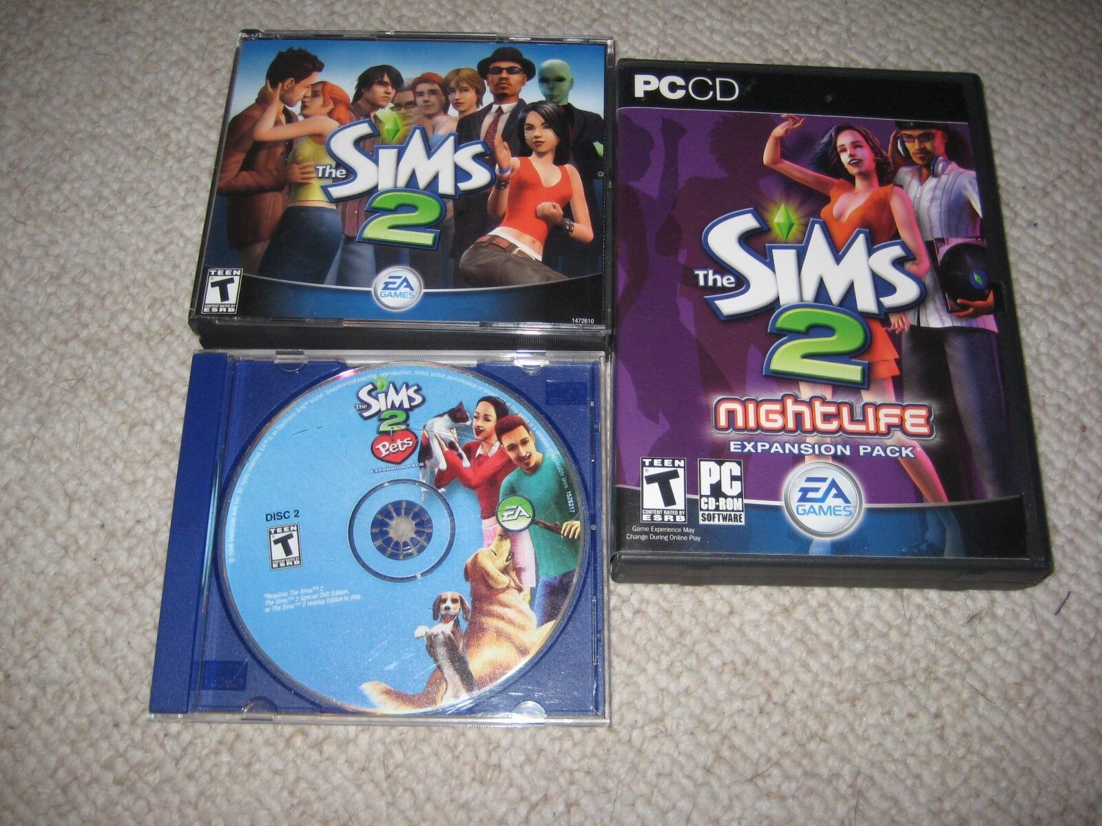 The Sims 2 EA Games 4 Discs + Pets disc #2 Nightlife disc #2 PC-CD  14633154122