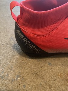 red nike mercurial indoor shoes
