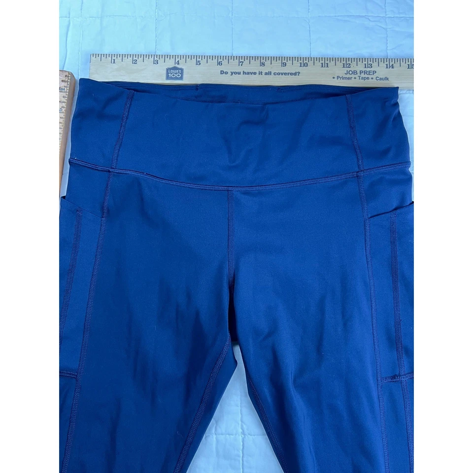 Athleta Ultimate Stash 7/8 紧身海军蓝打底裤女式 L 码口袋 — 第 2/4 张图片