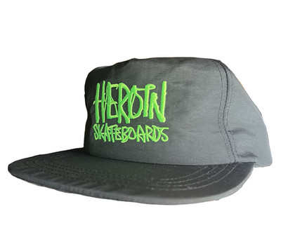 Heroin Skateboards Script Black / Green Nylon Snapback Hat
