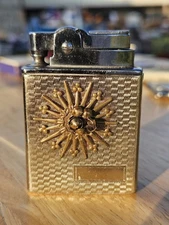 Vintage Lador Japan Table Lighter Gold Tone Starburst Design 013478
