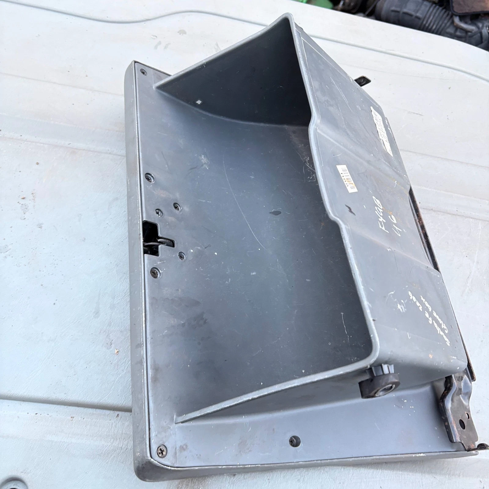 Hyundai Santa Fe SM glove box open storage bin and hinge detail