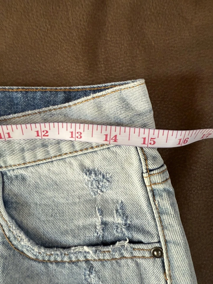 Falda vaquera de una cucharadita para mujer con corte de botón lavado claro Daisy Duke denim talla 27 Foto 3 de 4