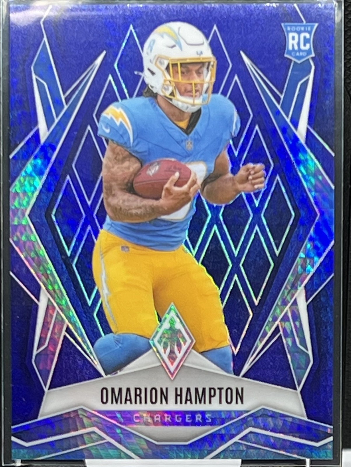 2025 Panini Phoenix - Rookies Omarion Hampton #192 Blue Hyper /199 (RC)