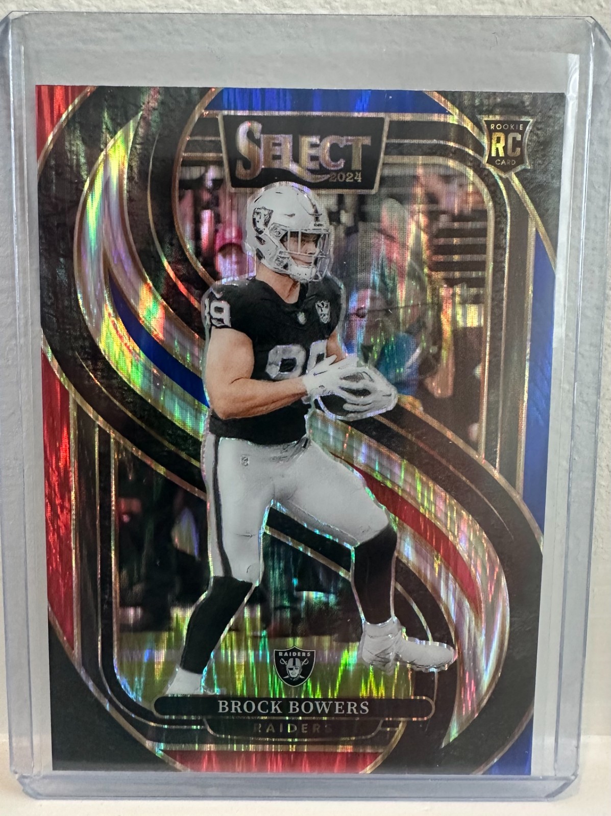2024 Panini Select - Premier Level Brock Bowers #118 Red & Blue Shock Prizm (RC)