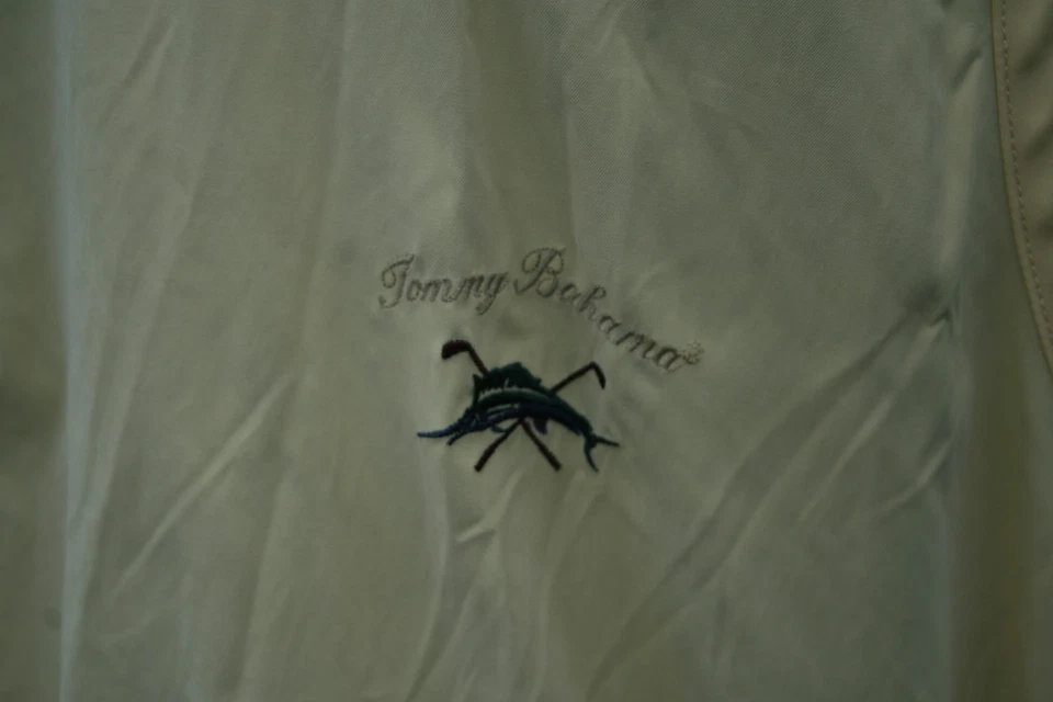 Chaleco de golf Tommy Bahama talla M amarillo forrado cuello en V bolsillos delanteros cremalleras laterales para hombre Foto 4 de 4