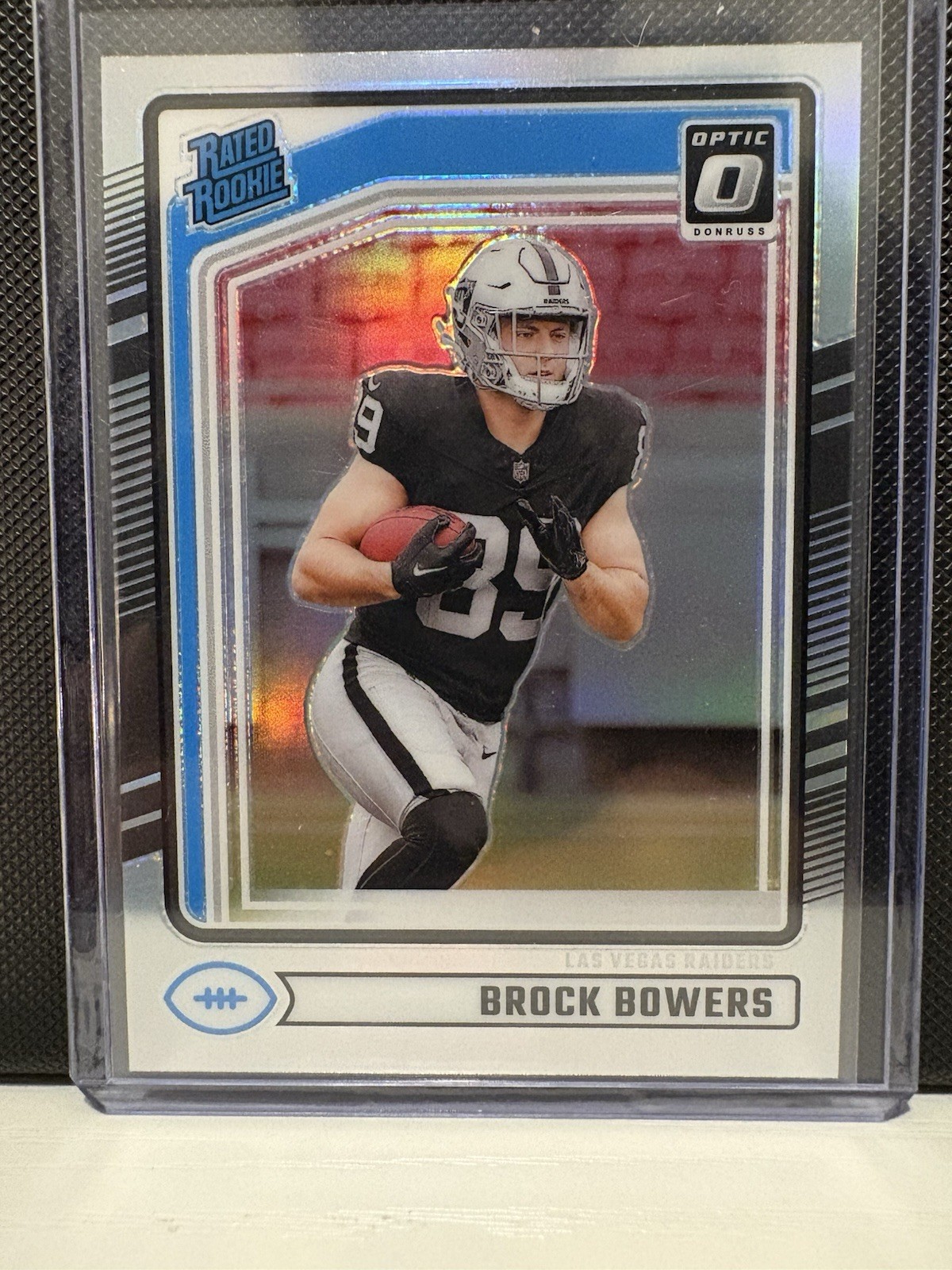 2024 Panini Donruss - Rated Rookie Brock Bowers #394 Optic Preview Holo Prizm RC