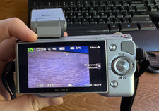 Sony Alpha NEX-5 Silver 3.0 LCD 14.2MP Digital Camera, Sony SEL1855 Lens, Bag