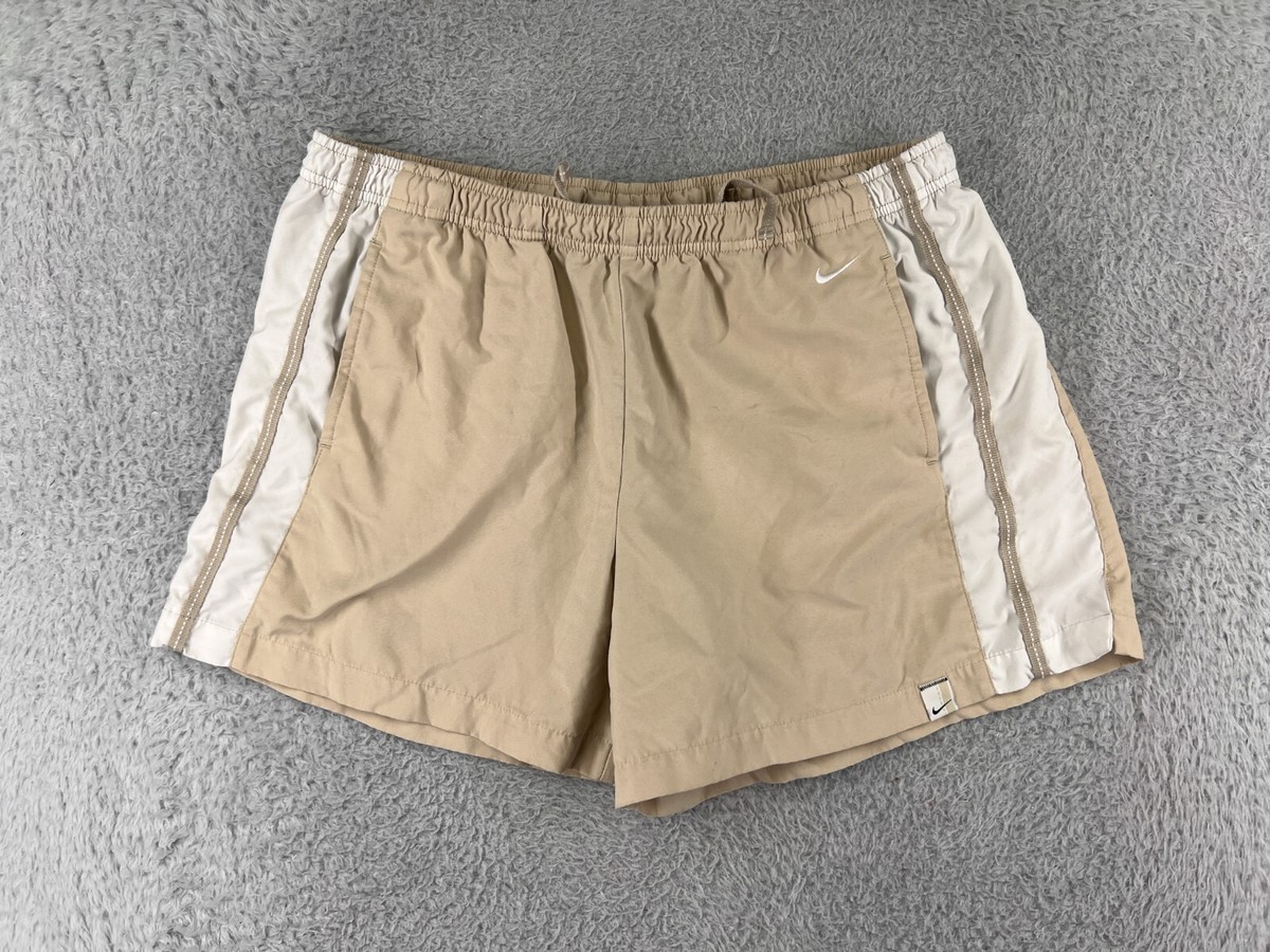 beige nike shorts womens