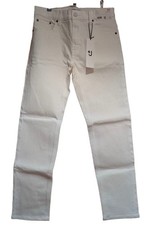 Jeans rectos ajustados con ribete Uniqlo + J cintura 30 usados bajo lavado al agua