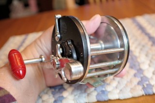 RARE....EARLY PENN LONG BEACH REEL...FULLY FUNCTIONAL...ALL ORIGINAL WITH CRACK