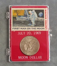 First Man On The Moon Stamp & Moon Dollar Coin Set