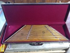 Santour. Persian harp. Wooden body. Metal strings. 36"x10.5"x4". In case. 