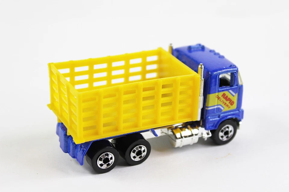 Camión de estacas/ganado azul Hot Wheels escala 1:64 1981 Foto 2 de 4