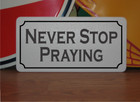 Never Stop Praying Metal Sign